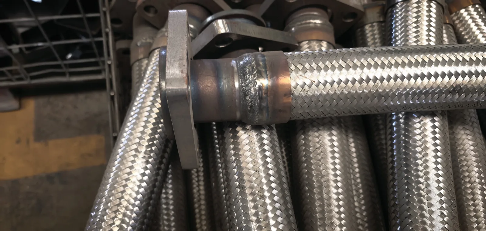 Custom braided compressor hose connection detail
