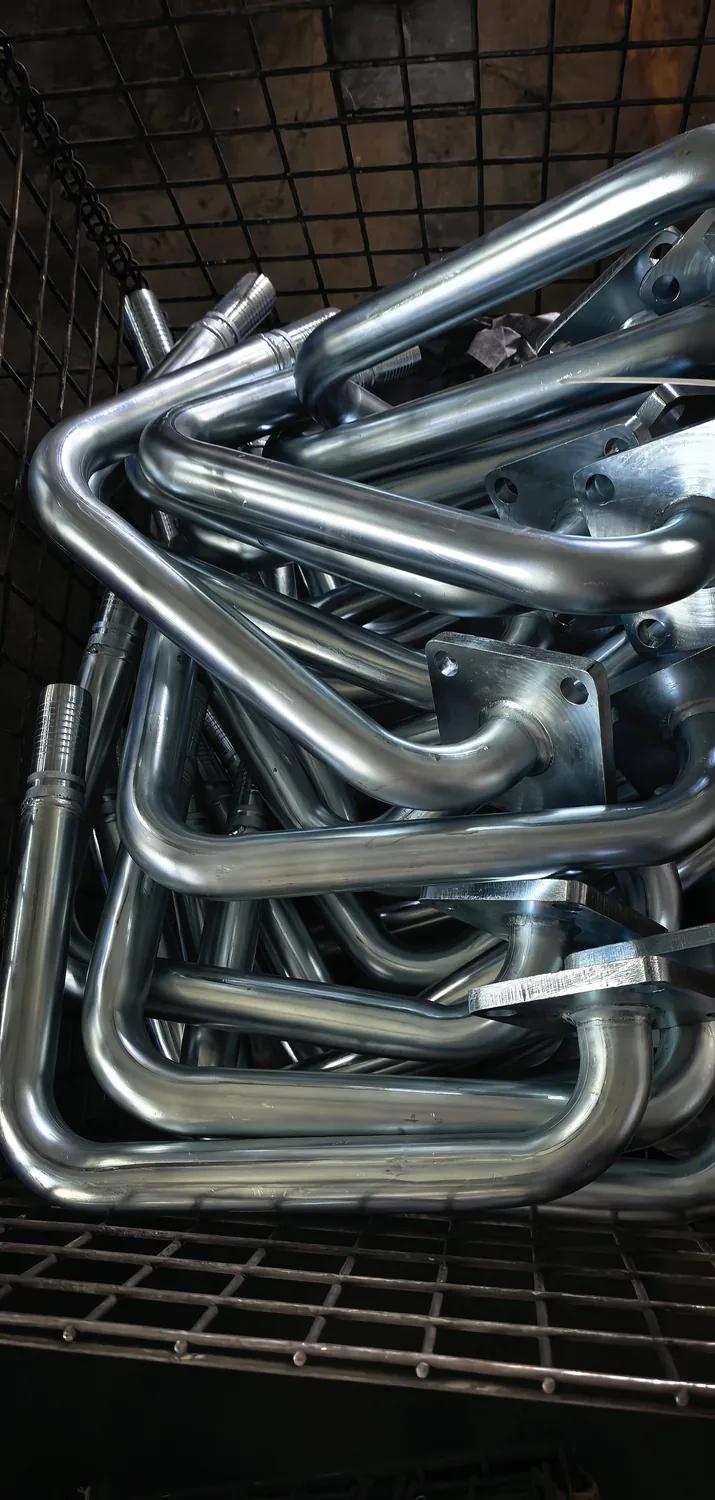 Custom metal cooling coil for an air compressor