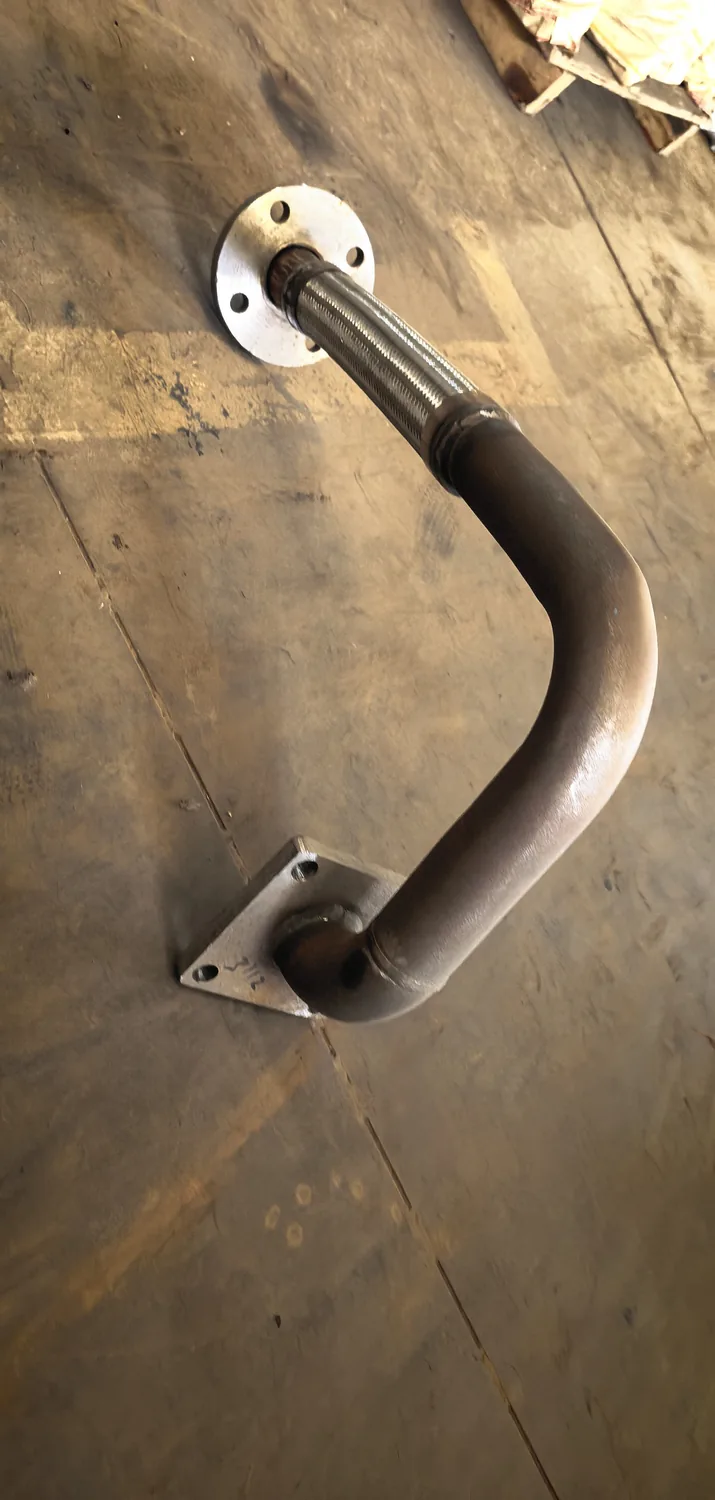 Custom bent compressor tube with flange connection